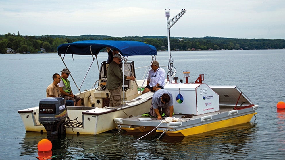 Scientists installing environmental monitoring system on Skaneateles Lake