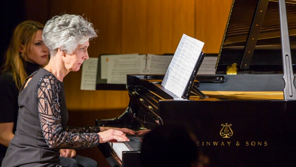 Mary Simoni playing piano