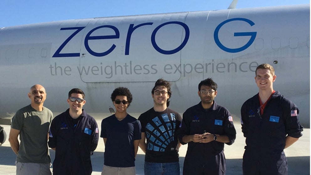 Professor Amir Hirsa and students in front of Zero G Airplane