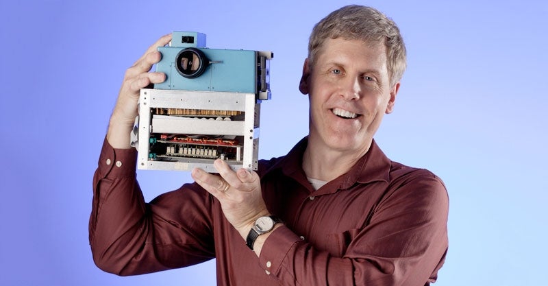 Steve Sasson '72, holding his digital camera