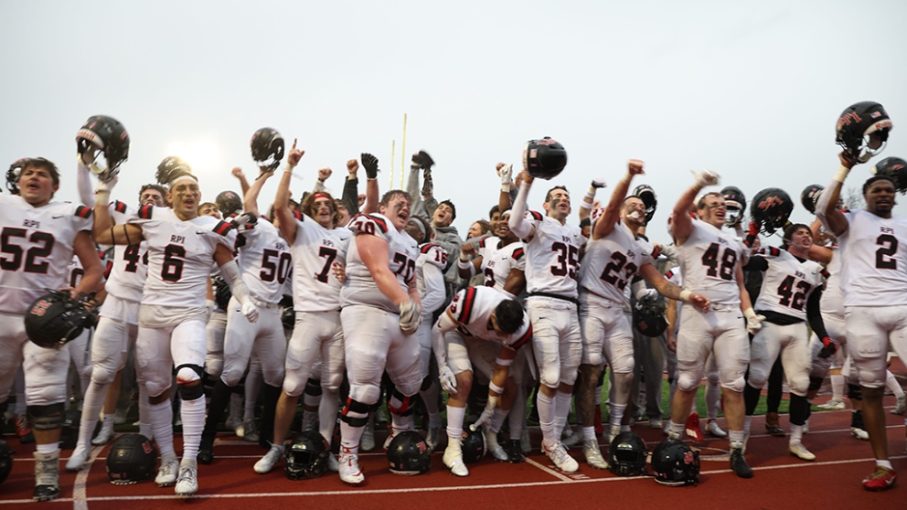 RPI football team celebrating a win