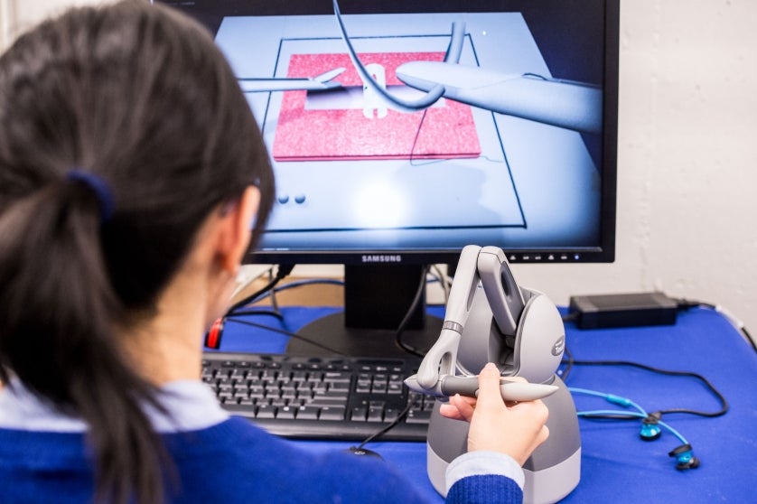 Student demonstrates virtual surgery technology
