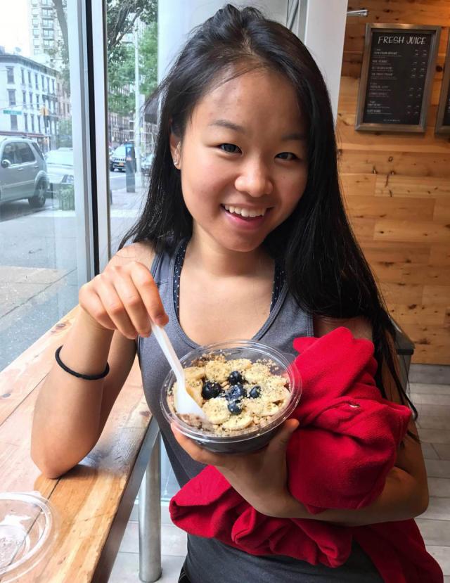 Wan Na Chun holding bowl of organic oatmeal