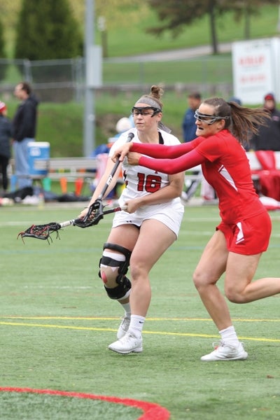 Liz Brady playing lacrosse